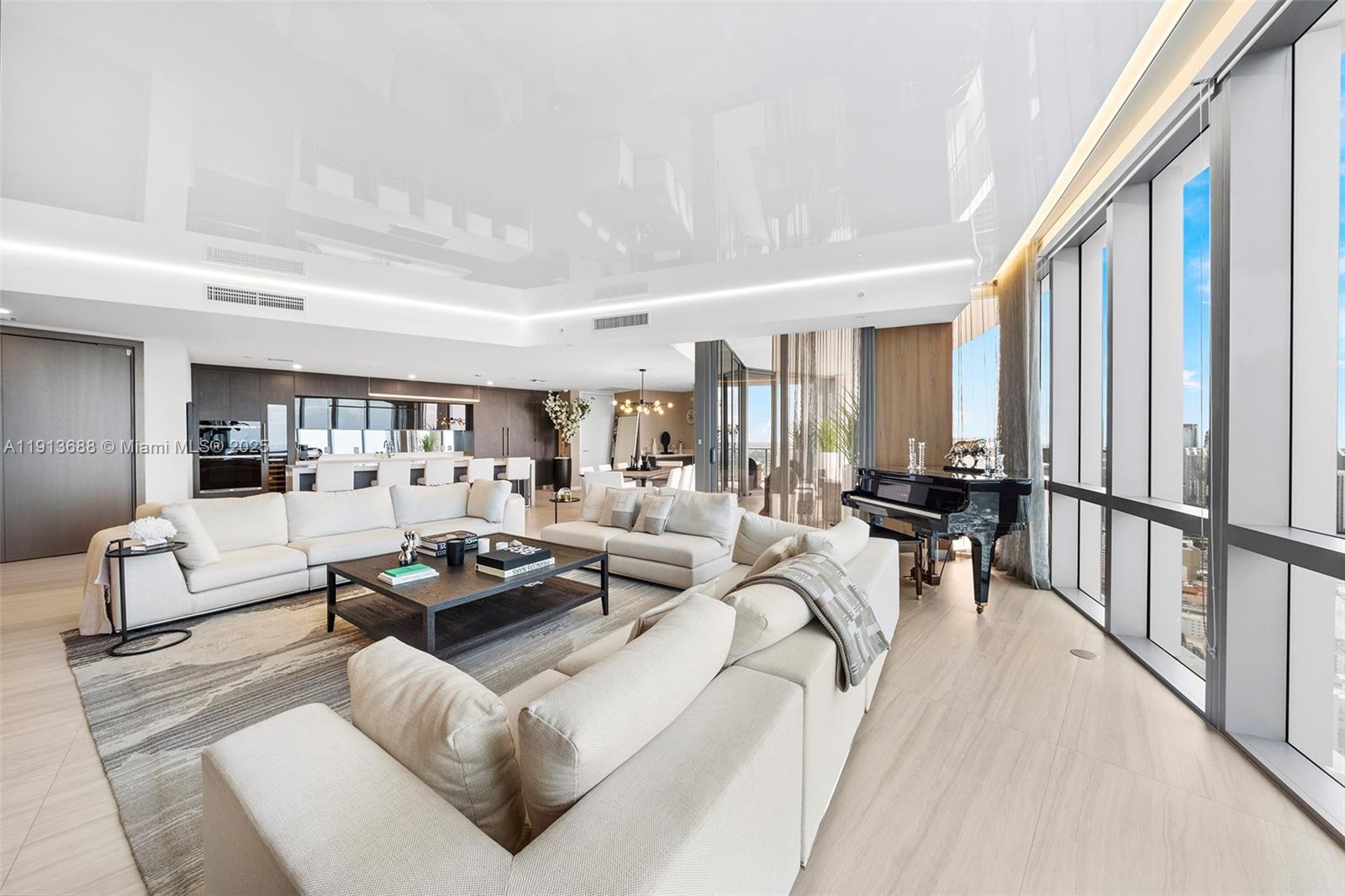 851 Northeast 1st Avenue, Unit 5312 Miami, FL 33132 - Photo 5 of 53 a living room with furniture and a table