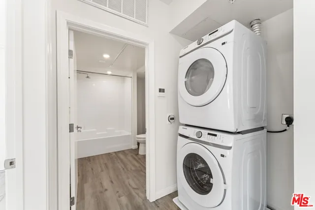 a bathroom with a toilet a sink and a bathtub
