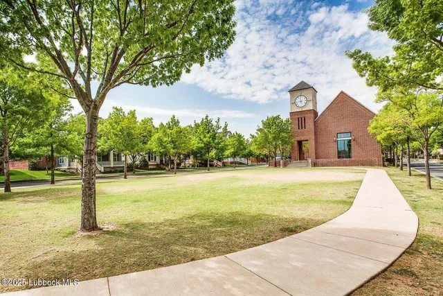 a view of swimming pool with a yard