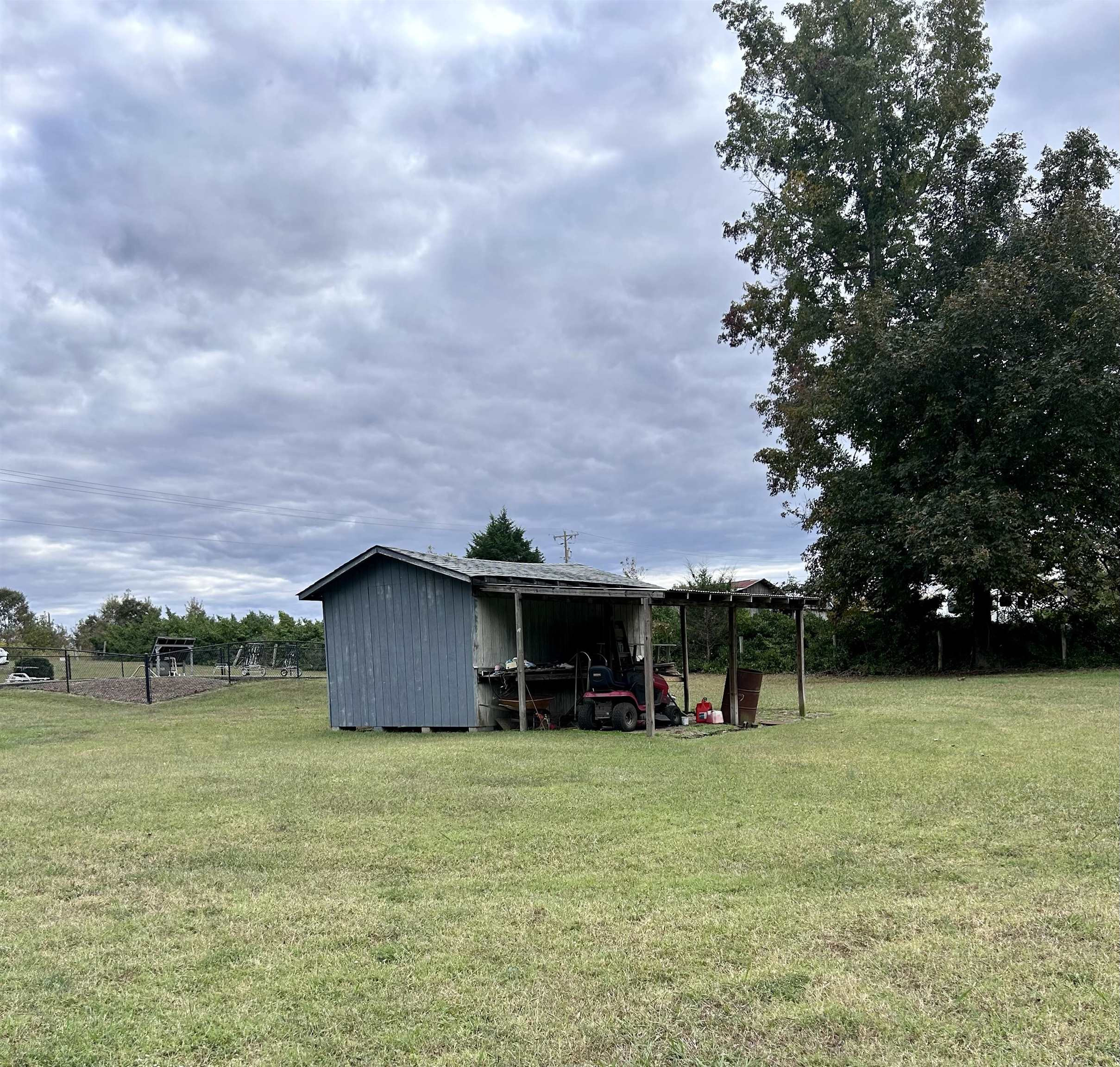 4145 Swannie Coble Road Snow Camp, NC 27349 - Photo 3 of 11 a view of a house with pool and a yard