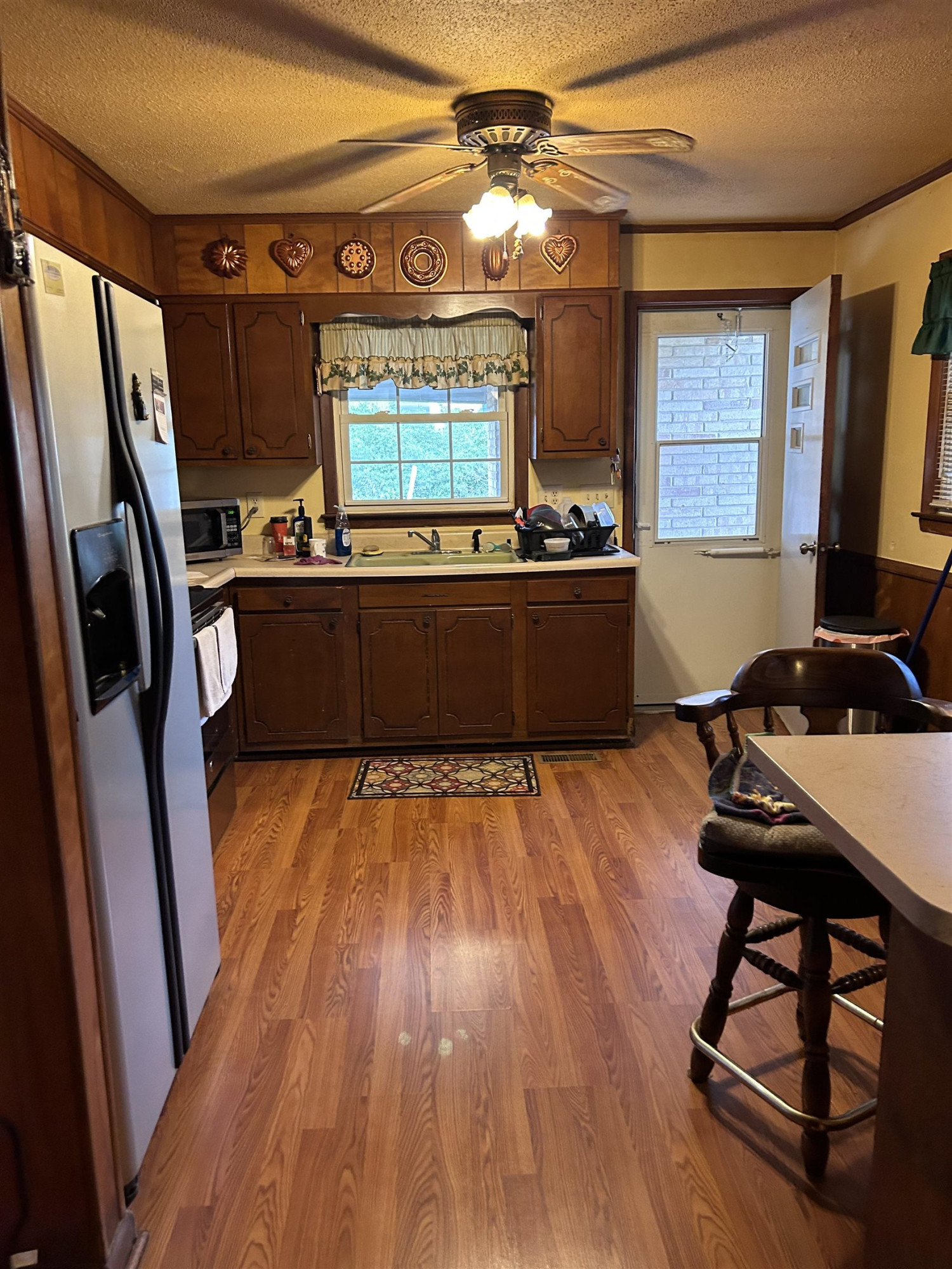 4145 Swannie Coble Road Snow Camp, NC 27349 - Photo 6 of 11 a room with wooden floor and a window