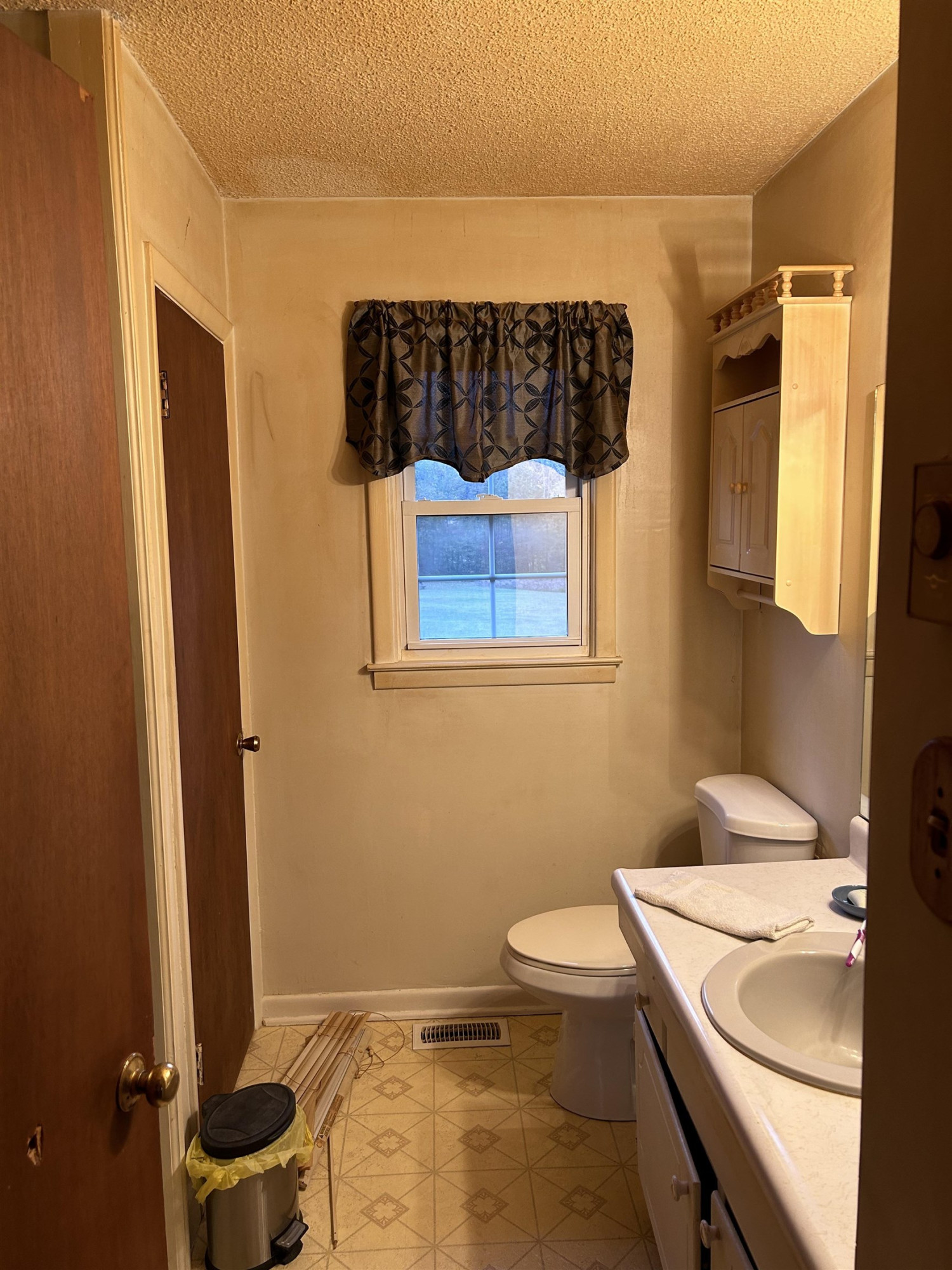 4145 Swannie Coble Road Snow Camp, NC 27349 - Photo 9 of 11 a bathroom with a sink a toilet and shower