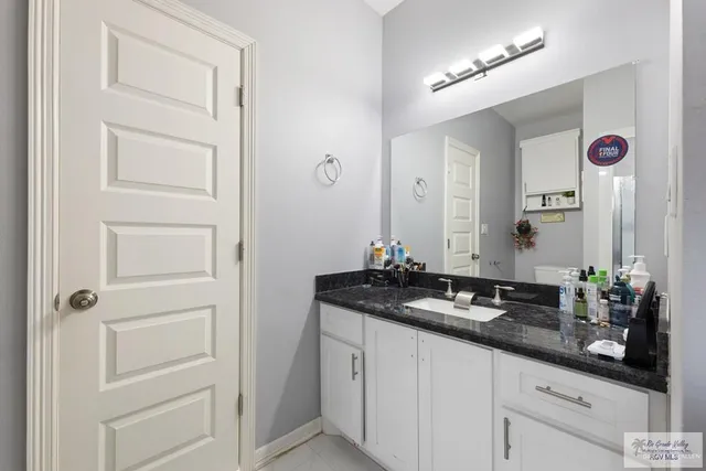 a close view of sink and mirror