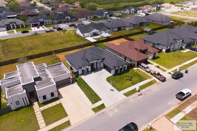 an aerial view of a swimming pool patio and mountain view