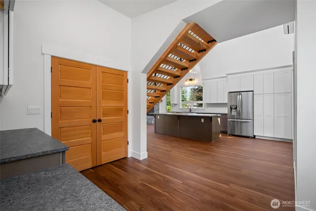a view of kitchen and wooden floor