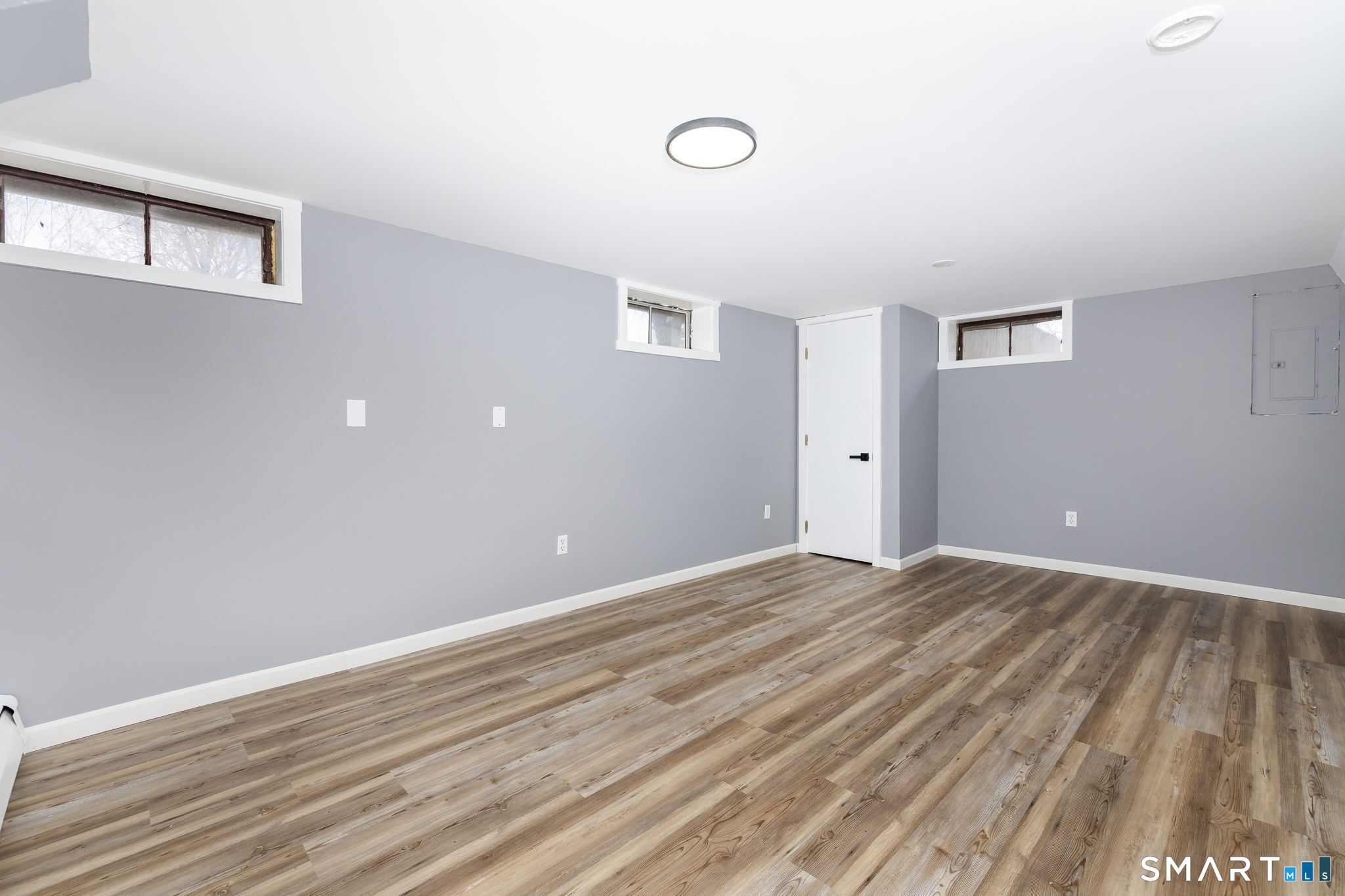555 Graham Road South Windsor, CT 06074 - Photo 13 of 39 a view of an empty room with wooden floor