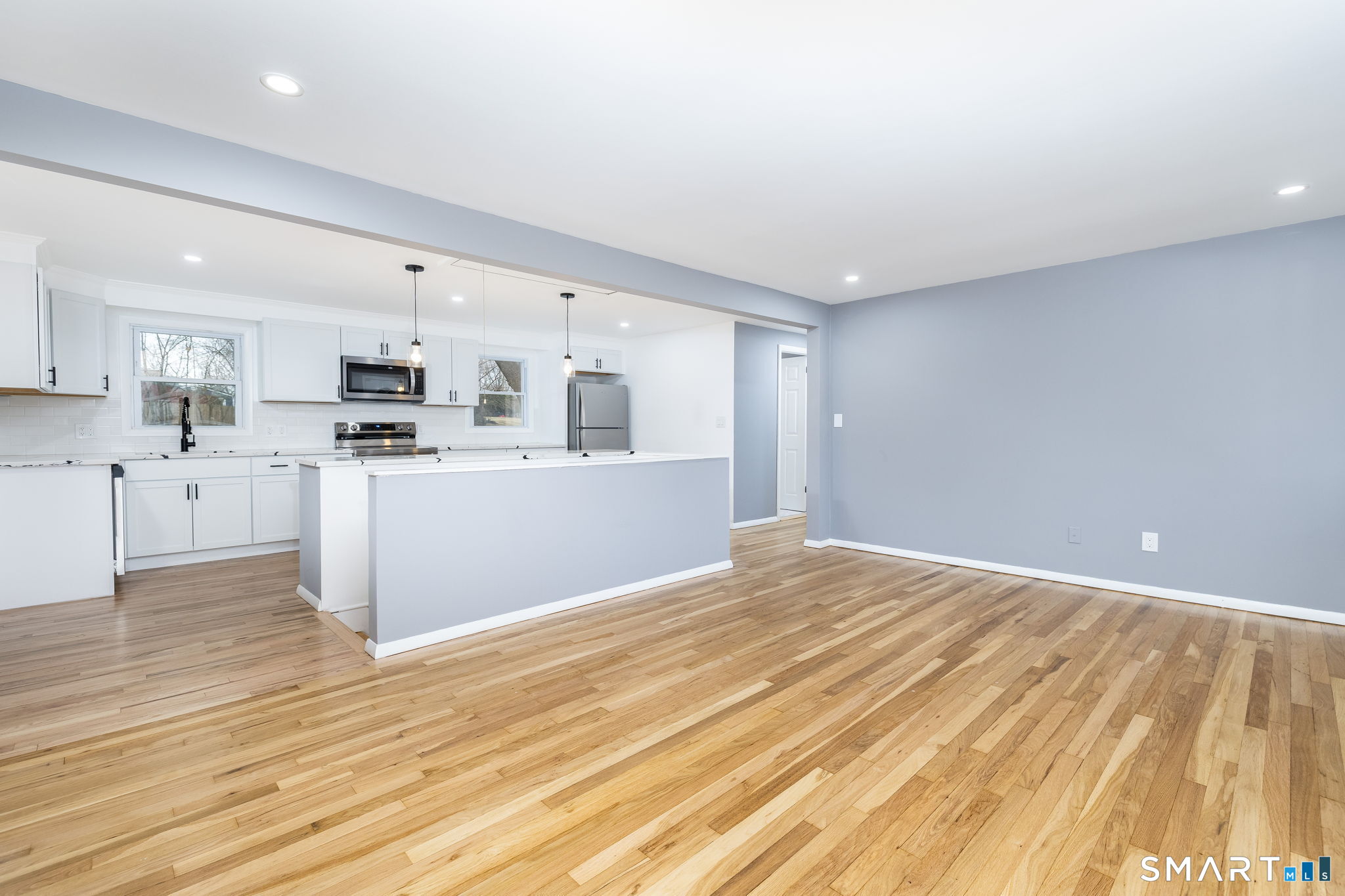 555 Graham Road South Windsor, CT 06074 - Photo 14 of 39 a view of a kitchen with wooden floor