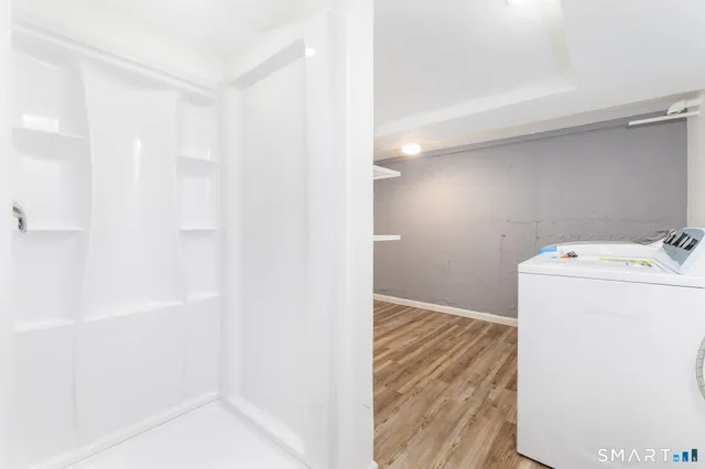 a utility room with dryer and washer