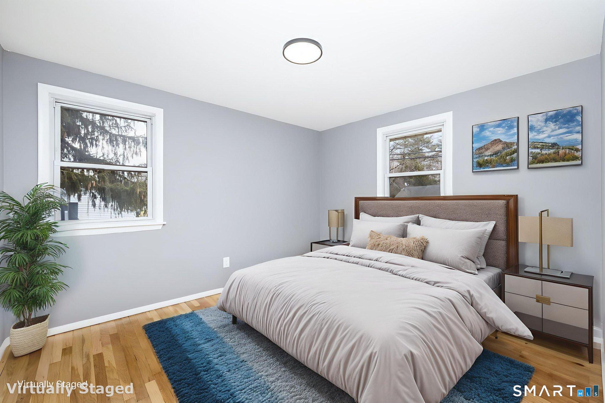555 Graham Road South Windsor, CT 06074 - Photo 26 of 39 a bedroom with a bed and a window