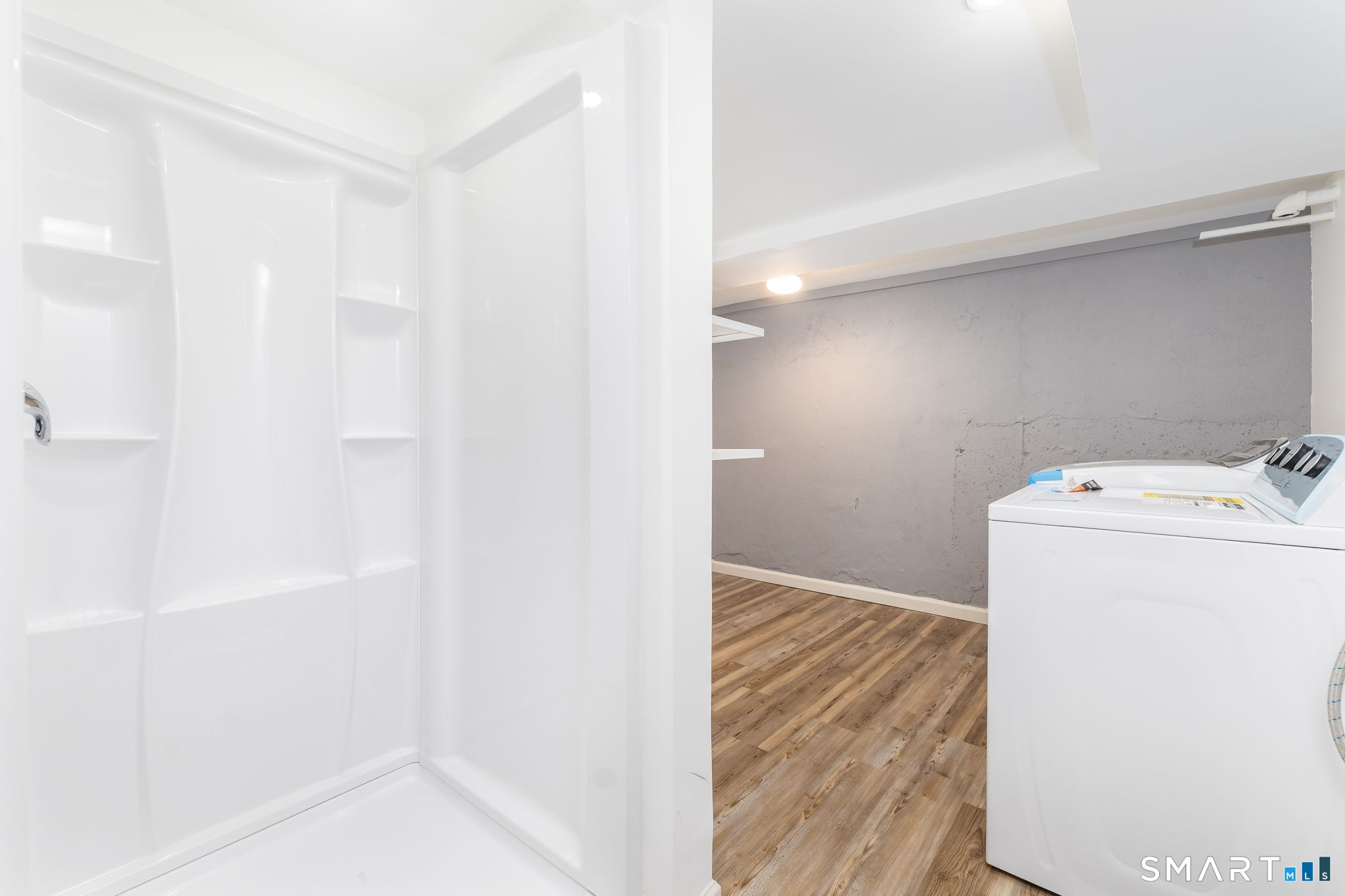 555 Graham Road South Windsor, CT 06074 - Photo 29 of 39 a view of a storage & utility room with washer and dryer