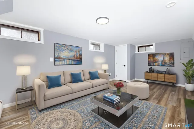 a view of an empty room and wooden floor