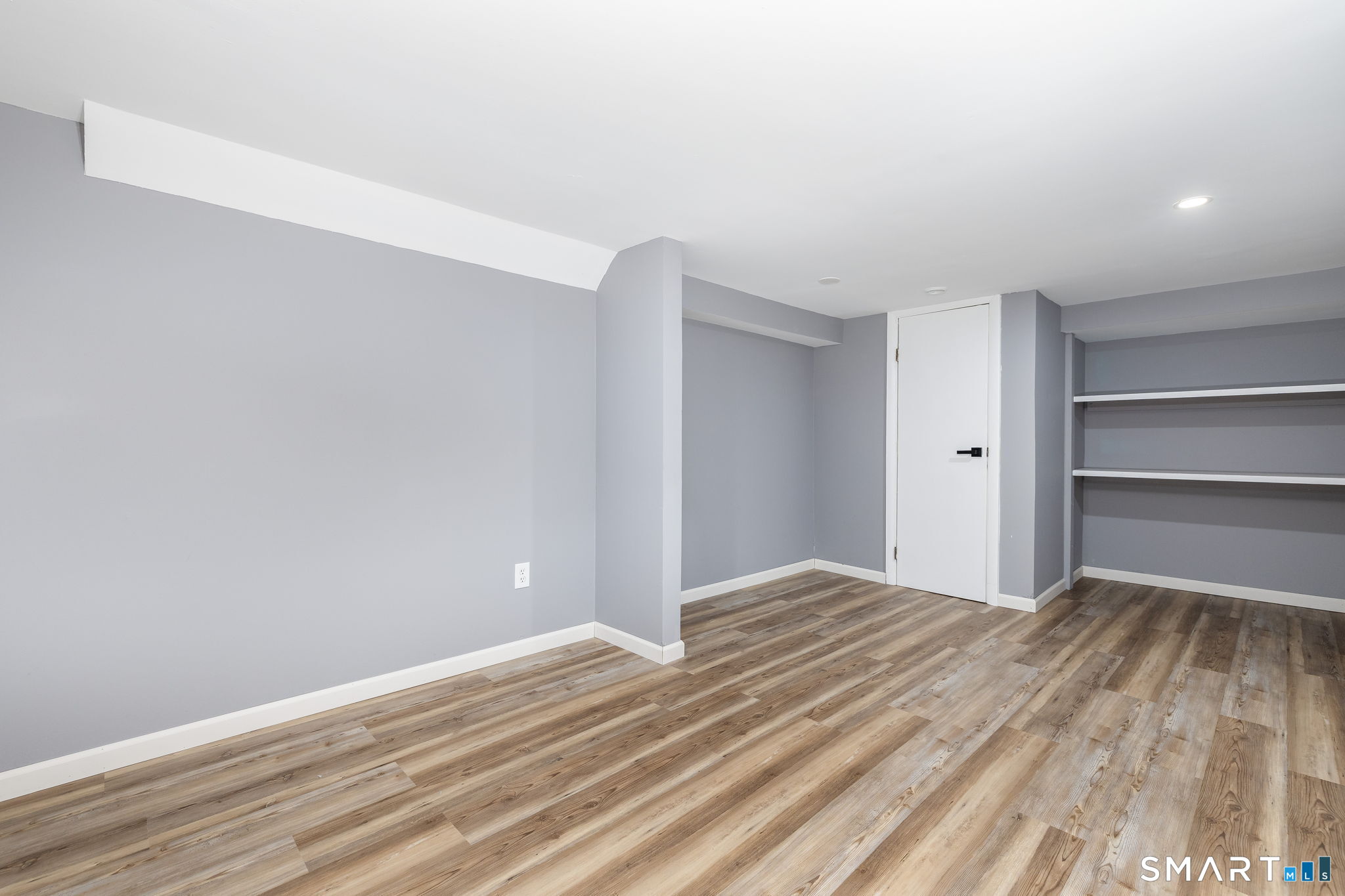 555 Graham Road South Windsor, CT 06074 - Photo 31 of 39 a view of empty room with wooden floor