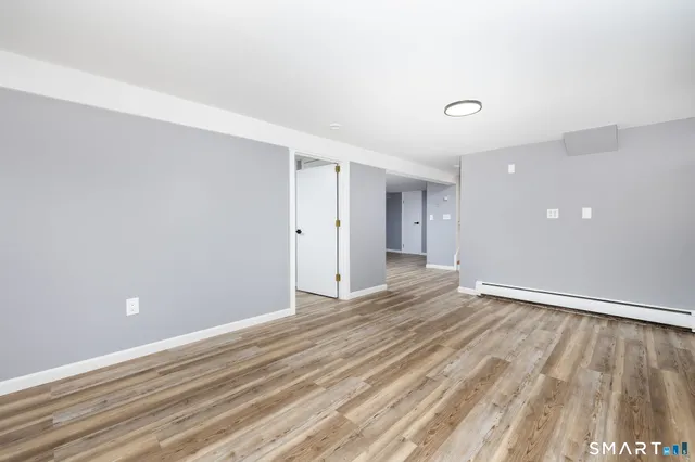 a view of a room with an empty space