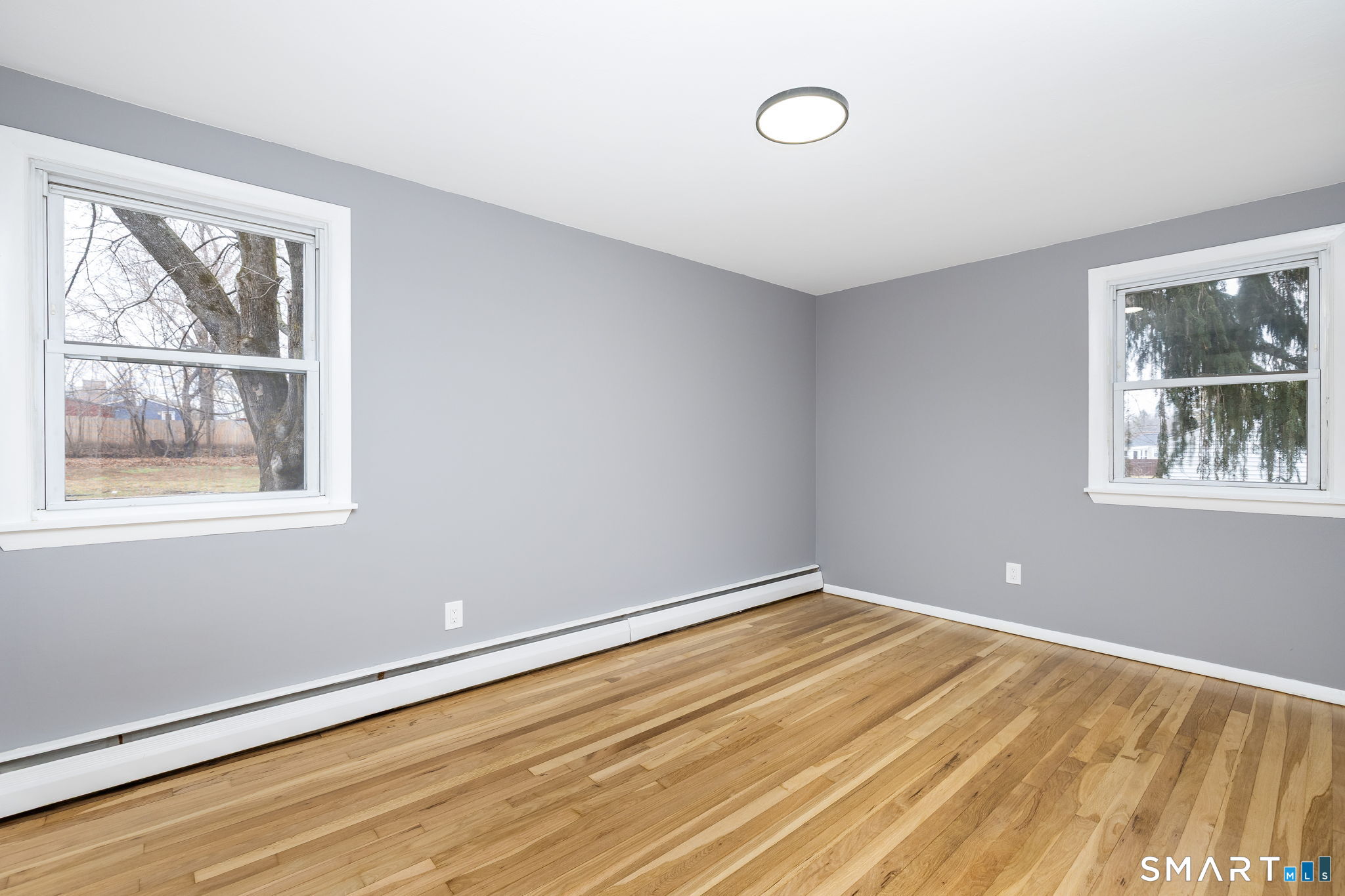 555 Graham Road South Windsor, CT 06074 - Photo 10 of 39 a view of an empty room with a window