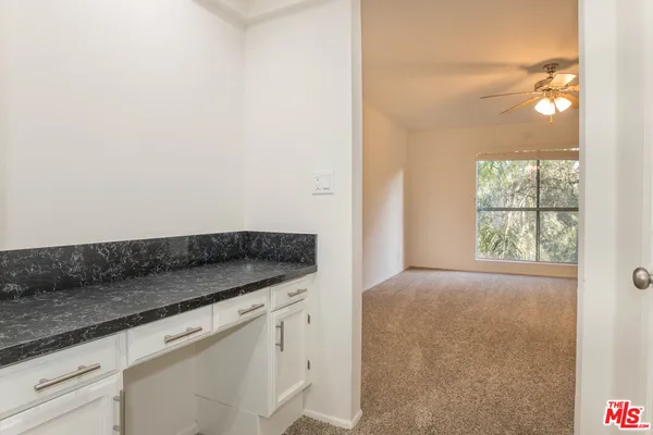 a view of kitchen and window