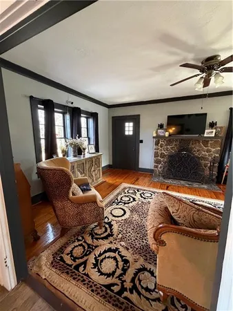 a living room with furniture and a rug