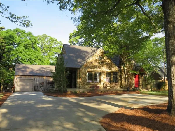 a front view of house with a yard