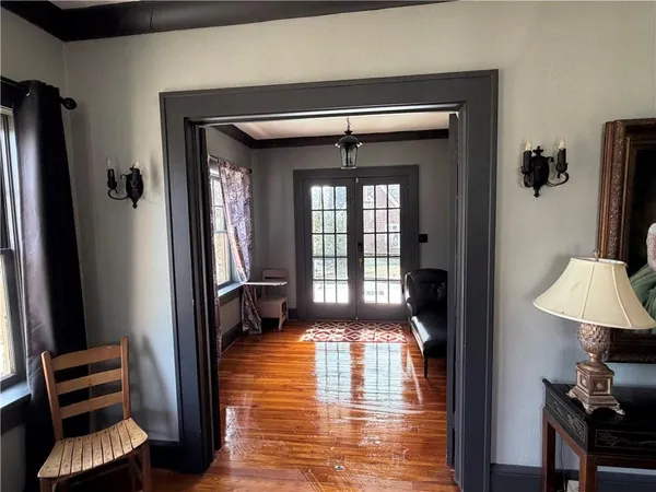 a view of living room with furniture and flowers