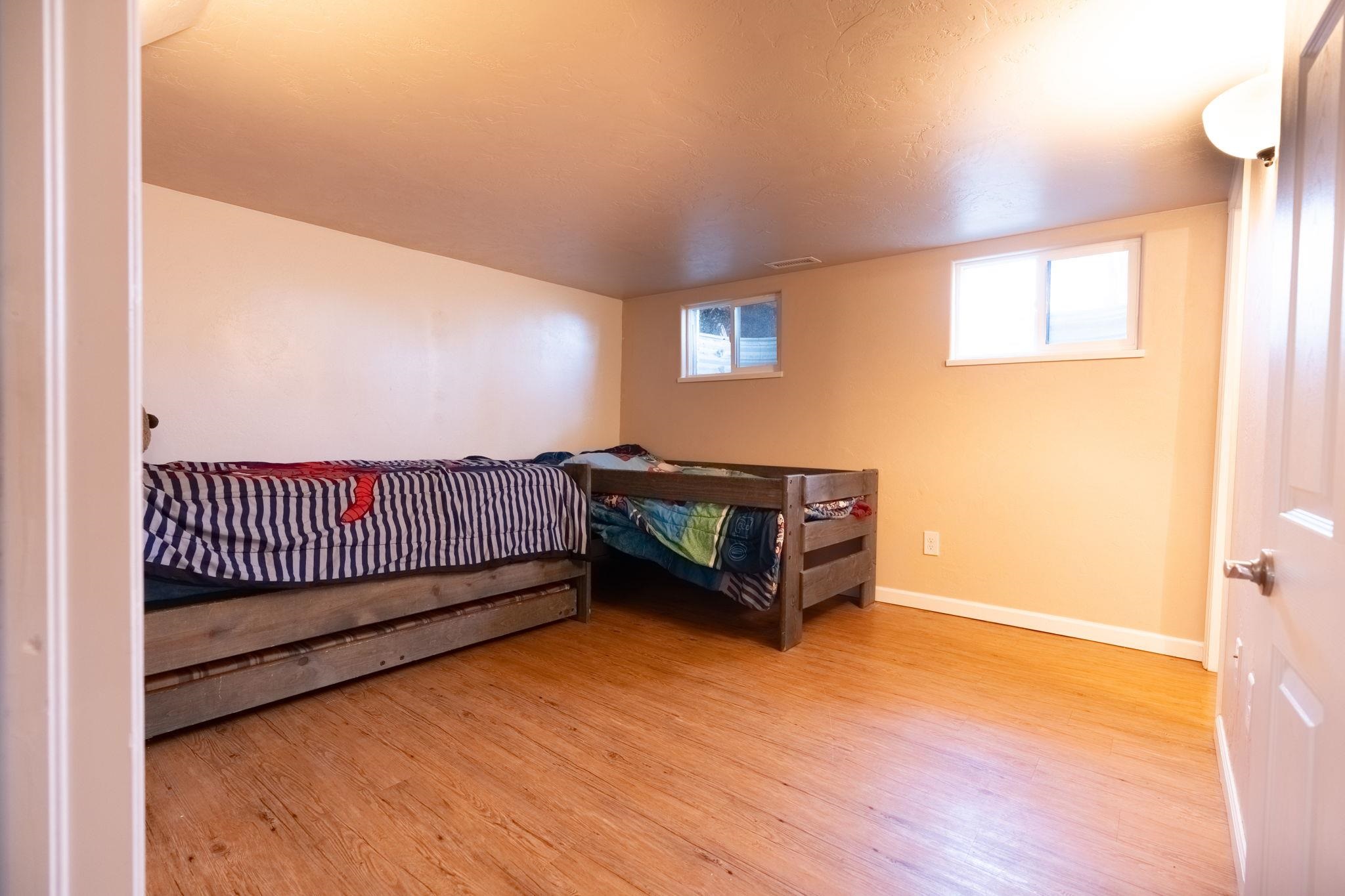 3055 E Road Grand Junction, CO 81504 - Photo 20 of 32 a view of a bedroom with wooden floor