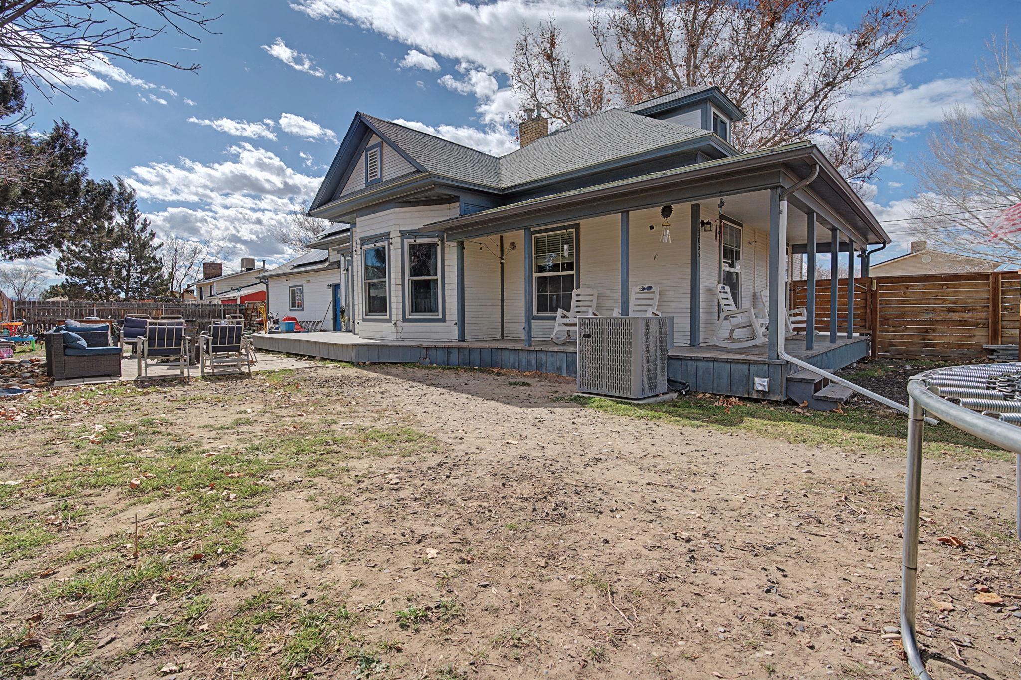 3055 E Road Grand Junction, CO 81504 - Photo 25 of 32 a front view of a house with garden