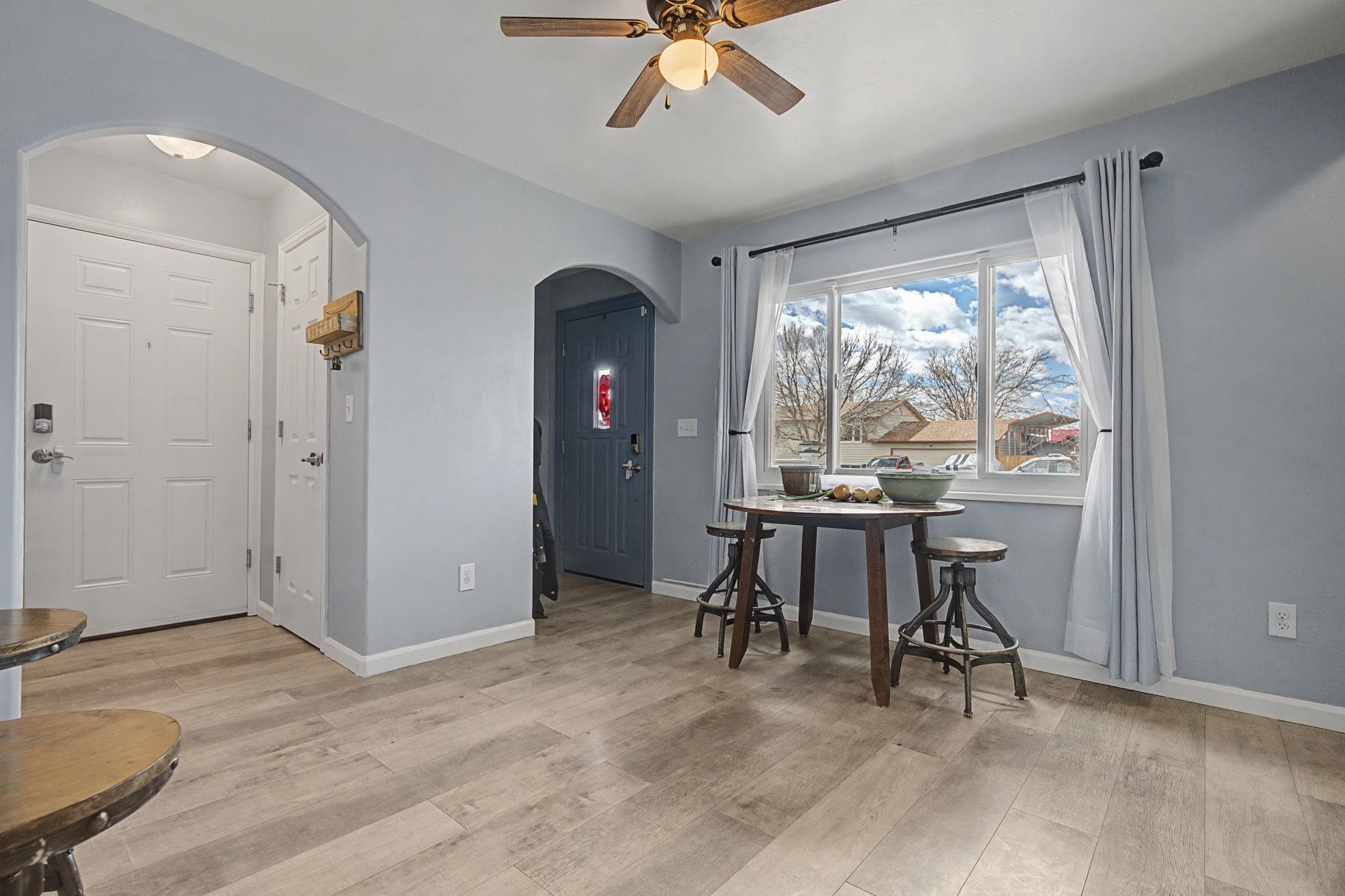 3055 E Road Grand Junction, CO 81504 - Photo 3 of 32 a view of a livingroom with furniture and a window