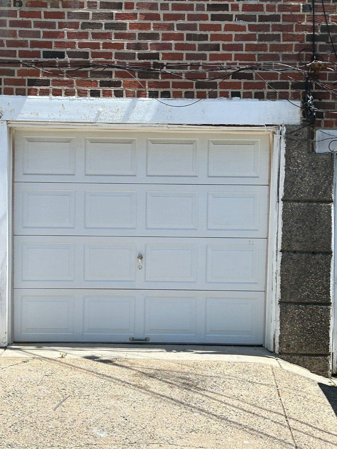 308 Burmont Road Drexel Hill, PA 19026 - Photo 20 of 20 Classic white garage door.