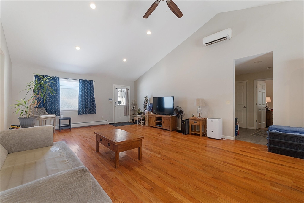 77 Old Keene Road Athol, MA 01331 - Photo 11 of 31 a living room with furniture and a flat screen tv