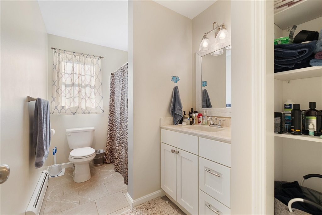 77 Old Keene Road Athol, MA 01331 - Photo 18 of 31 a bathroom with a toilet sink and mirror