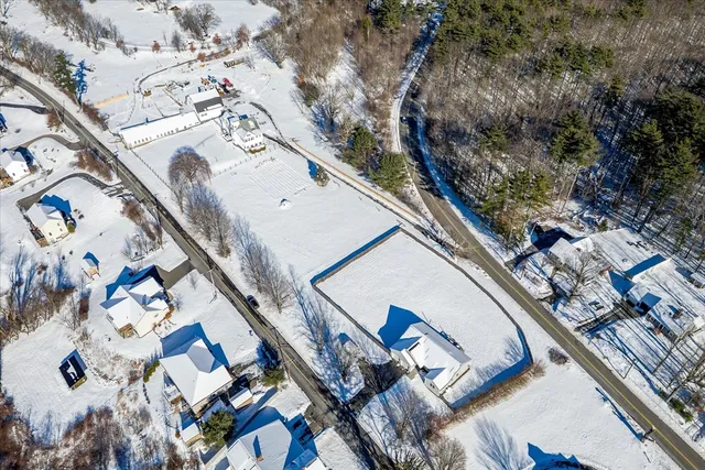 a view of house with yard