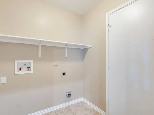 a view of a backyard with a fence