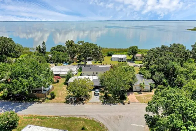 a view of a garden with a lake