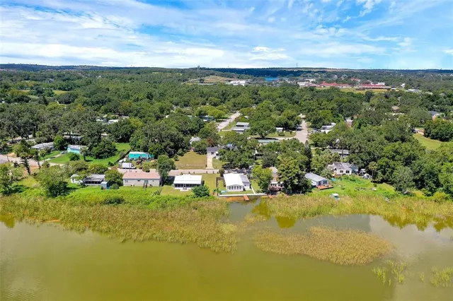 a view of a lake with a city