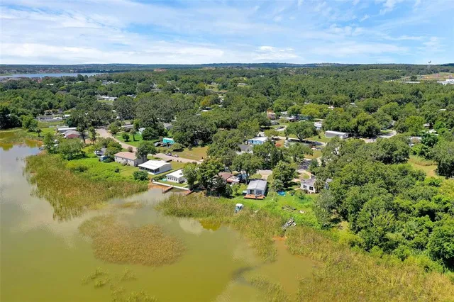 a view of a lake with a city