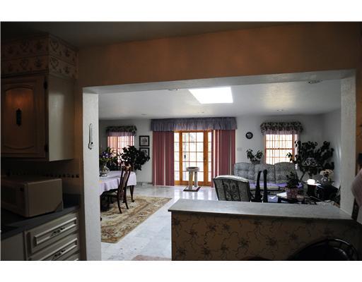 2048 Murdstone Road Upper St. Clair, PA 15241 - Photo 6 of 18 Kitchen. Kitchen eating area looking into the familyroom/diningroom