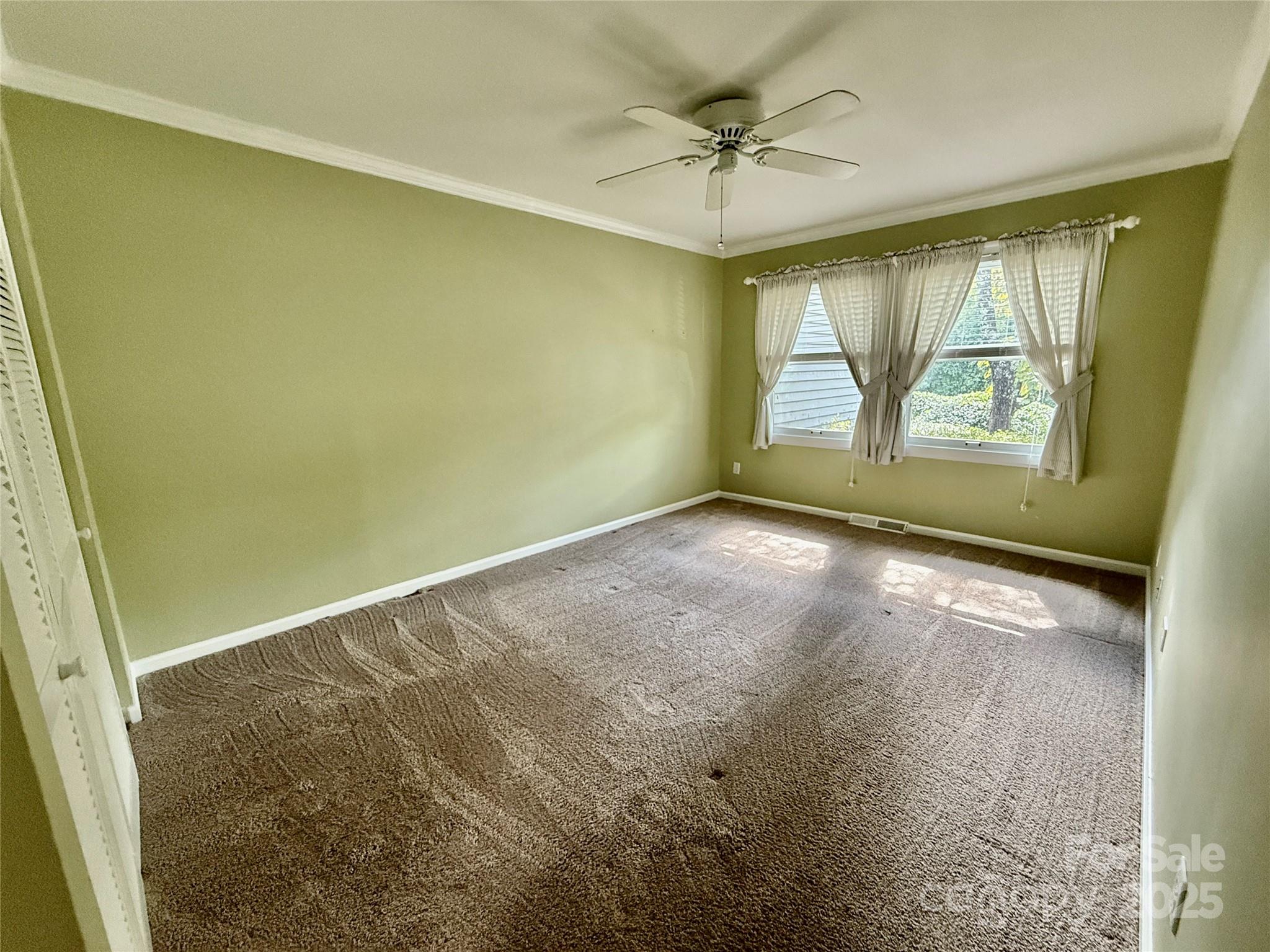 77 Chestnut Street, Unit 103 Tryon, NC 28782 - Photo 12 of 17 a view of room and window