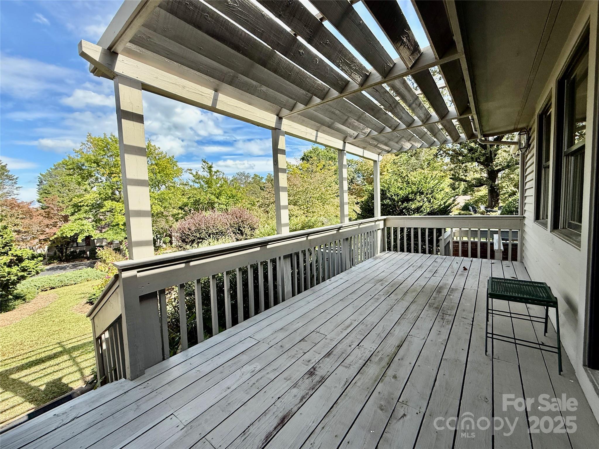77 Chestnut Street, Unit 103 Tryon, NC 28782 - Photo 5 of 17 a view of balcony with wooden floor