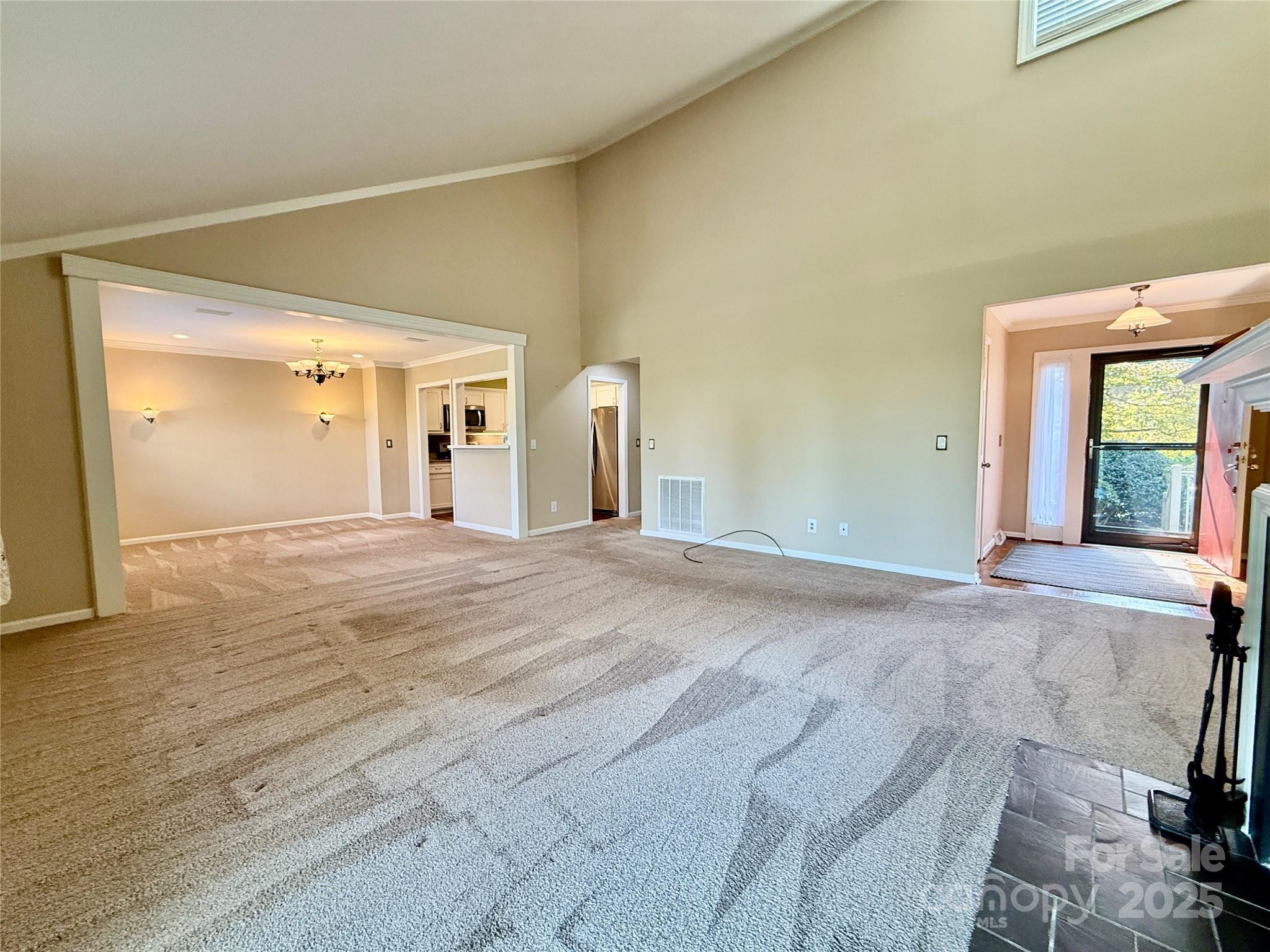 77 Chestnut Street, Unit 103 Tryon, NC 28782 - Photo 7 of 17 a view of a livingroom with wooden floor and furniture