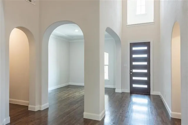 a view of entryway with wooden floor