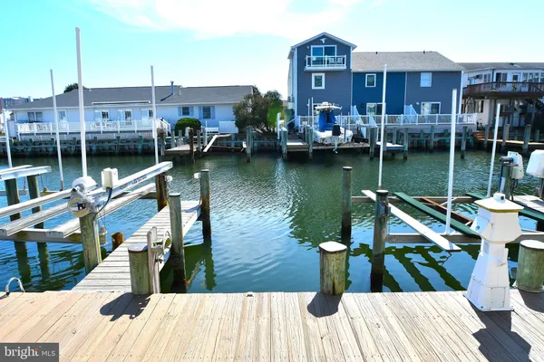 a view of a lake with a deck