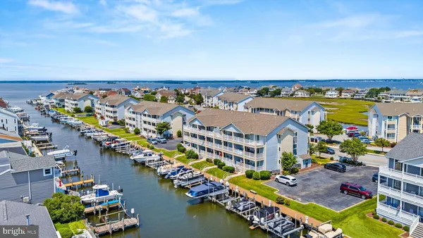 a view of swimming pool with outdoor seating and yard