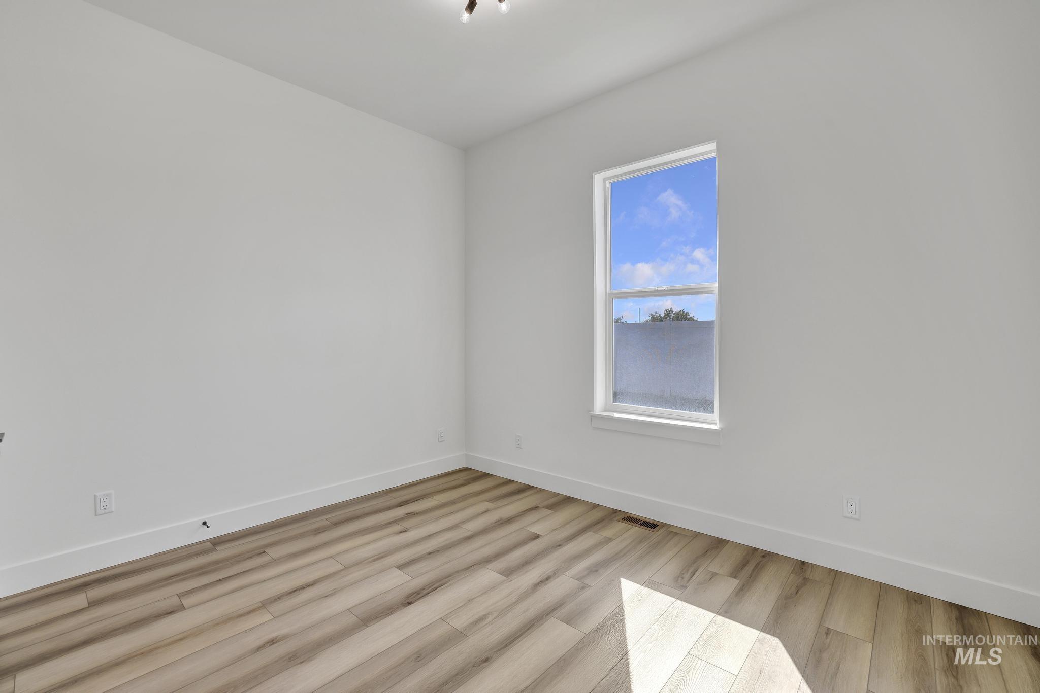 521 Falling Leaf Lane Twin Falls, ID 83301 - Photo 26 of 42 Spare room with light wood-style flooring