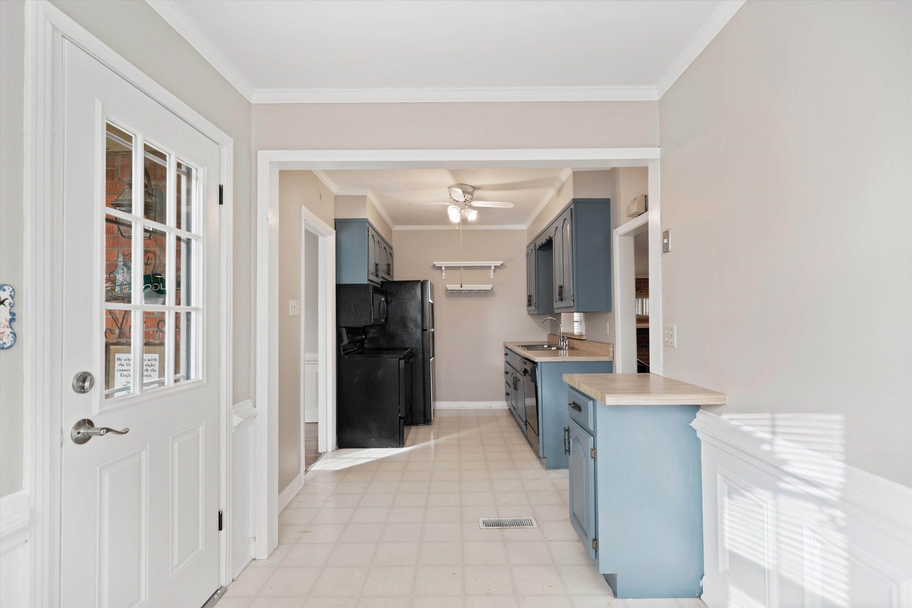 4863 Amboy Road Memphis, TN 38117 - Photo 11 of 26 a view of a kitchen from the hallway