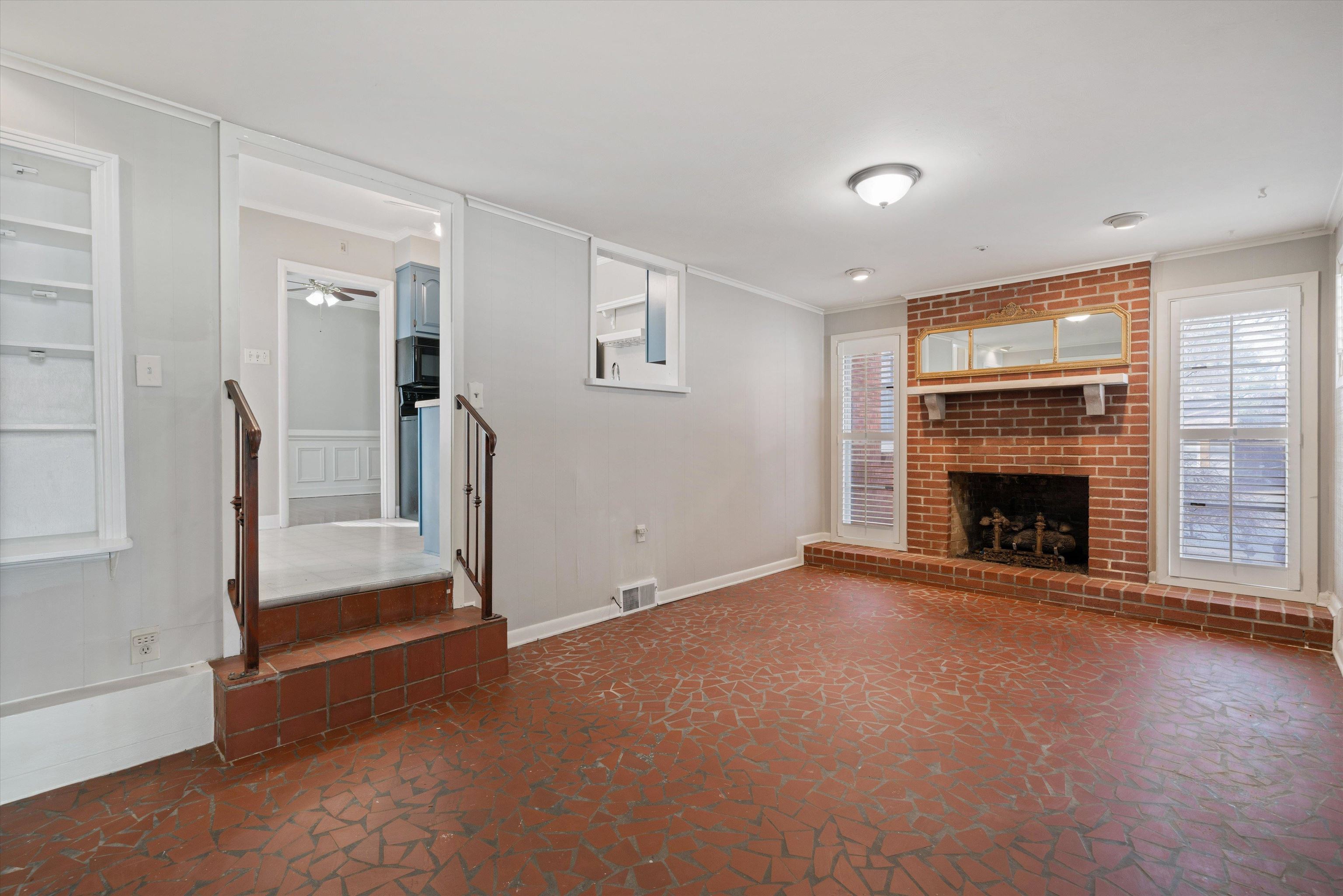 4863 Amboy Road Memphis, TN 38117 - Photo 22 of 26 a view of a livingroom with a fireplace