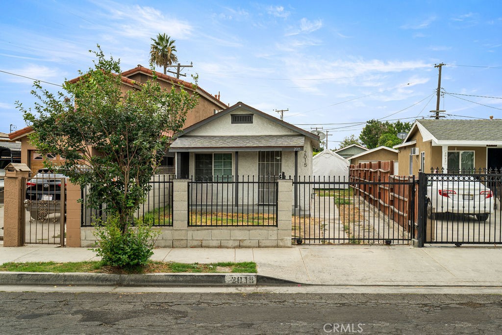 2015 Wayside Street Compton, CA 90222 - Photo 1 of 27 front view of a house
