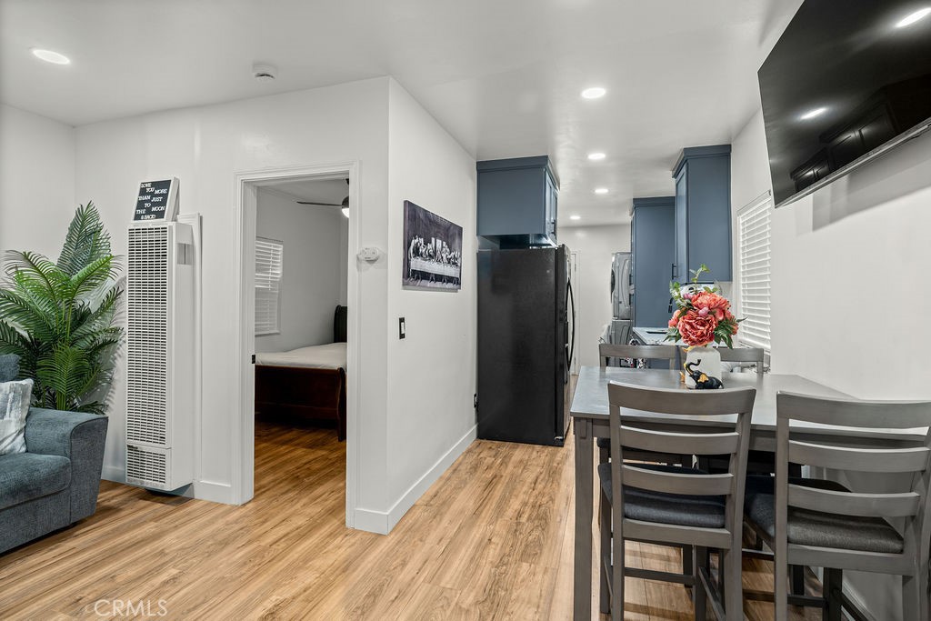 2015 Wayside Street Compton, CA 90222 - Photo 4 of 27 a kitchen with refrigerator and cabinets