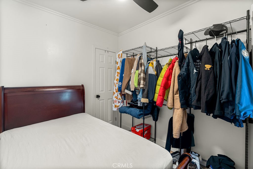 2015 Wayside Street Compton, CA 90222 - Photo 10 of 27 a bed room with a bed and a closet