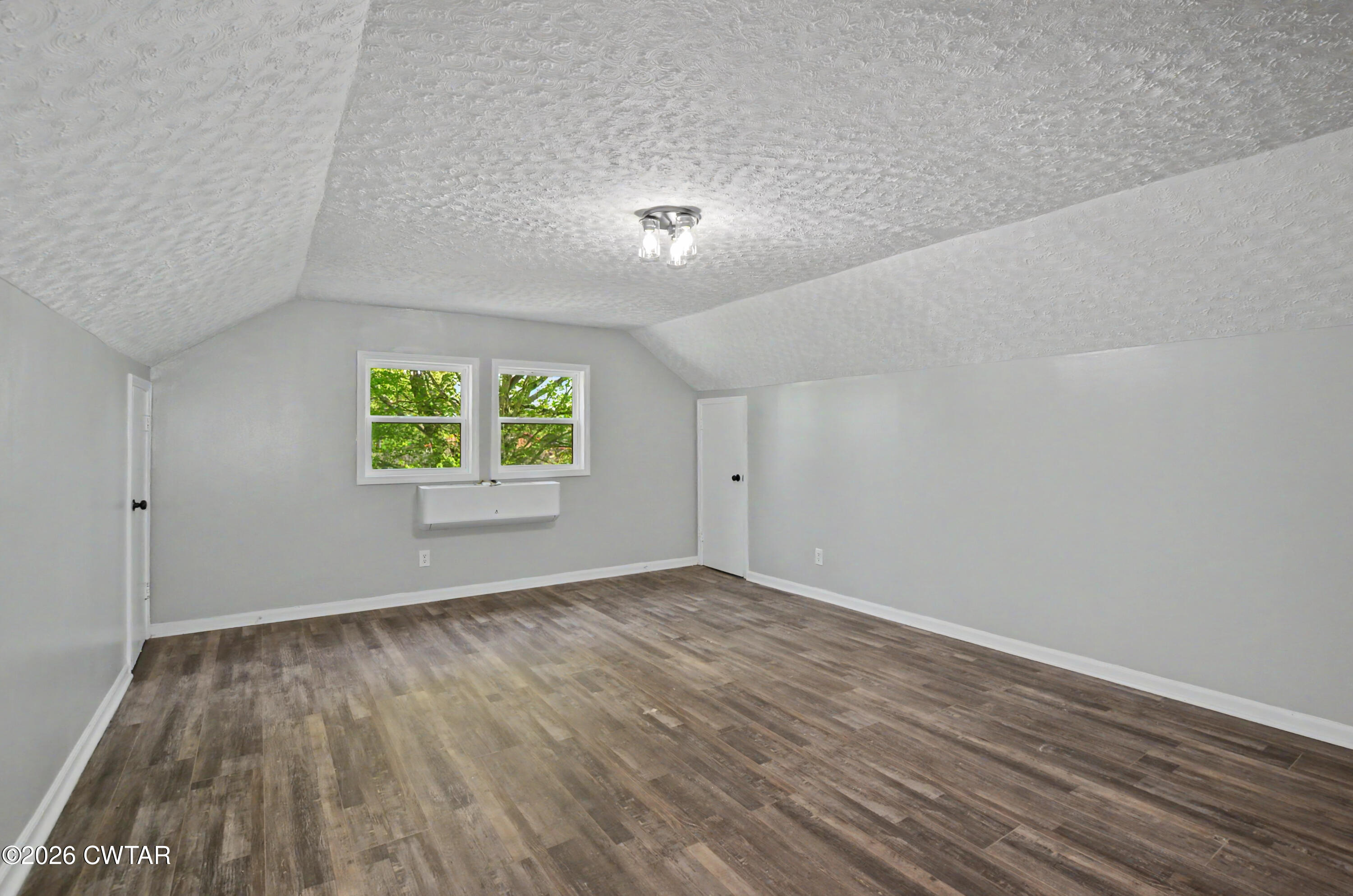 4177 Gum Flat Road Bells, TN 38006 - Photo 26 of 30 wooden floor in an empty room with a window