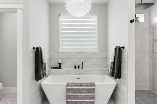 a bathroom with a sink and a bathtub