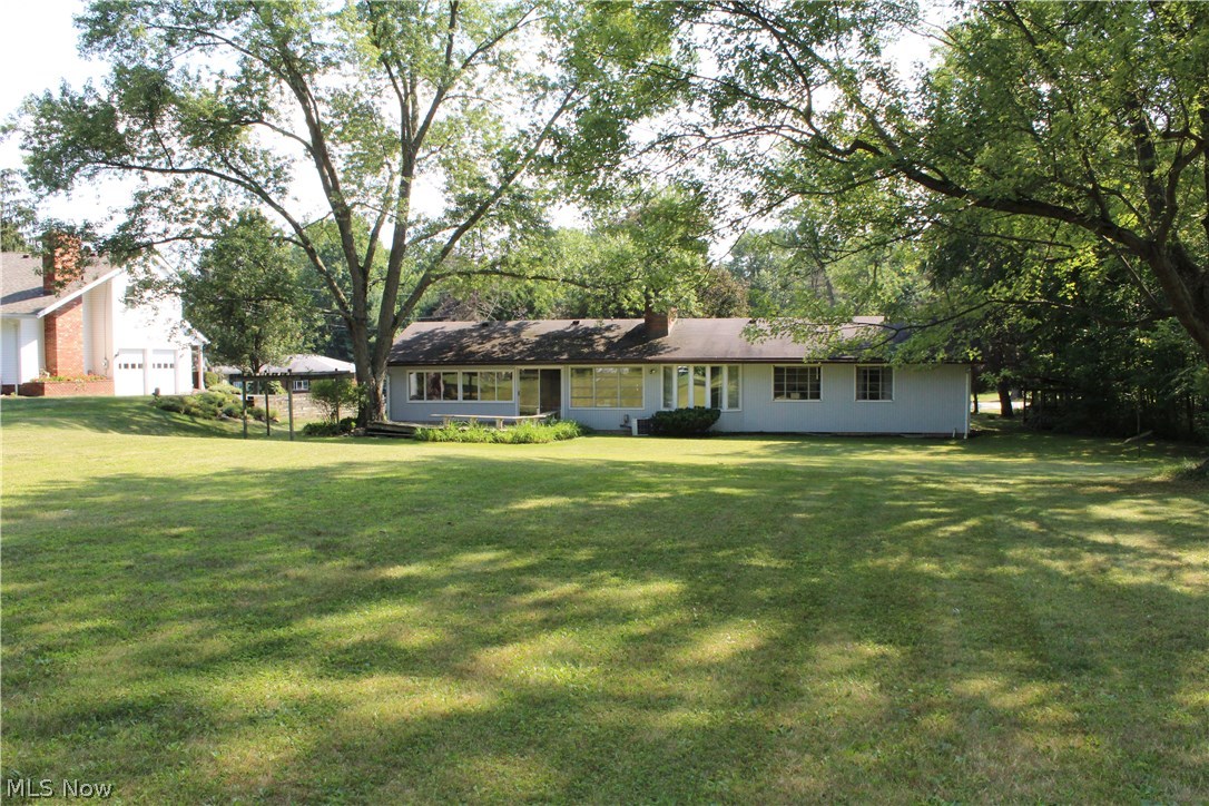1825 Walnut Road Kent, OH 44240 - Photo 23 of 23 Rear view of the home and backyard. Such a serene setting! Thank you for visiting 1825 Walnut Road in Kent, Ohio. Come see!
