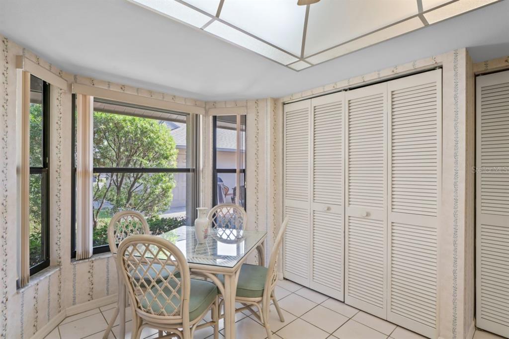 3274 Lori Lane, Unit 2 New Port Richey, FL 34655 - Photo 19 of 56 a view of a room with furniture and wooden floor